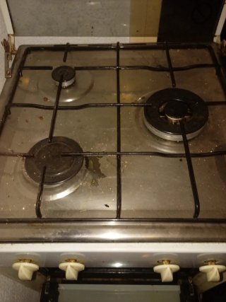 Cocina de gas blanca con horno marca Meireles