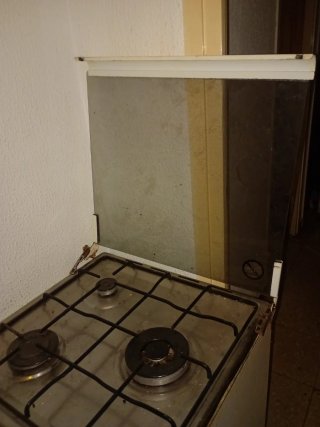 Cocina de gas blanca con horno marca Meireles