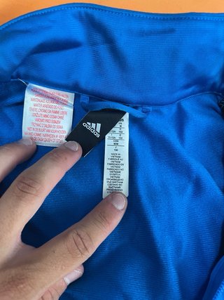 Chaqueta deportiva Adidas azul y negra