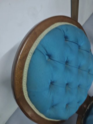 Mecedora vintage tapizada azul