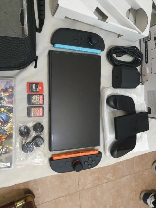 SWITCH 2 + 3 JUEGOS + FUNDA Y PROTECTOR
