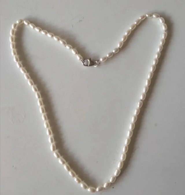 Collares de coral, perlas y cristal