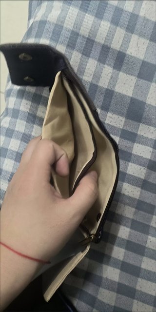 Cartera de lona negra y marrón