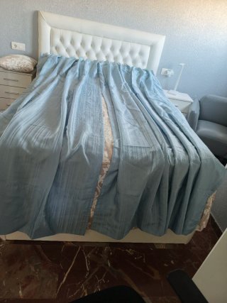 Cortinas de tela satinada y visillos
