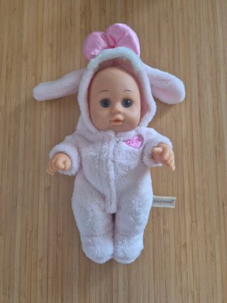 Muñeca bebé peluche rosa con orejas