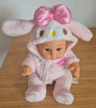 Muñeca bebé peluche rosa con orejas