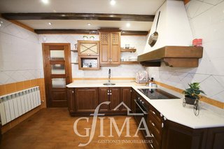 Casa adosada en venta en Tomelloso