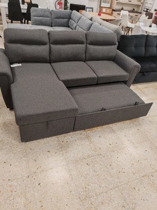 Sofá modular gris tela.