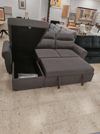 Sofá modular gris tela.