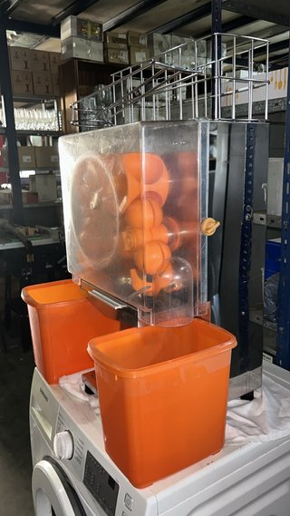 Exprimidor industrial de naranjas
