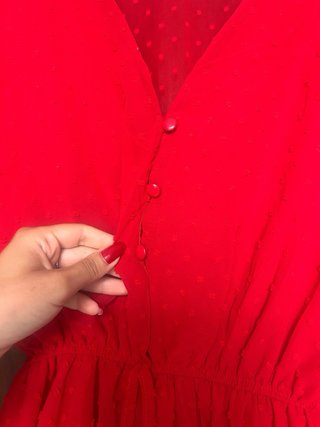 Mono corto rojo de lunares