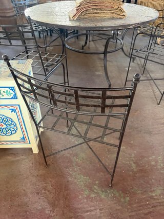 Sillón de jardín de metal con brazos