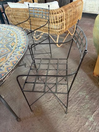 Sillón de jardín de metal con brazos