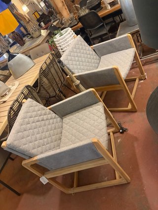 Sillón de diseño de teca y tapicería