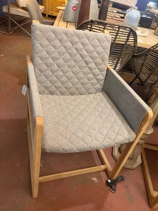 Sillón de diseño de teca y tapicería