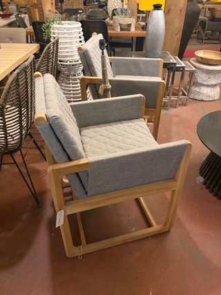 Sillón de diseño de teca y tapicería