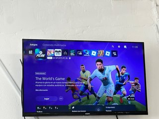 PlayStation 5 con 2 mandos y FC26