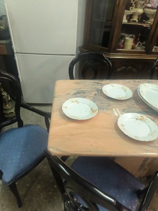 Mesa de mármol con 6 sillas