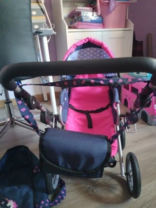 Carrito de muñecas azul y rosa