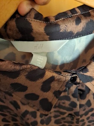 Blusa manga larga estampado leopardo Talla L