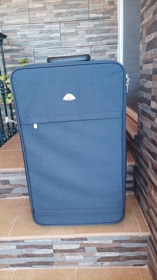Maleta de viaje azul. 71 / 42 / 26