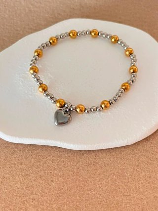 Pulsera con charm de corazón