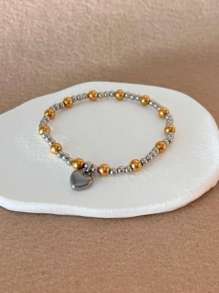 Pulsera con charm de corazón
