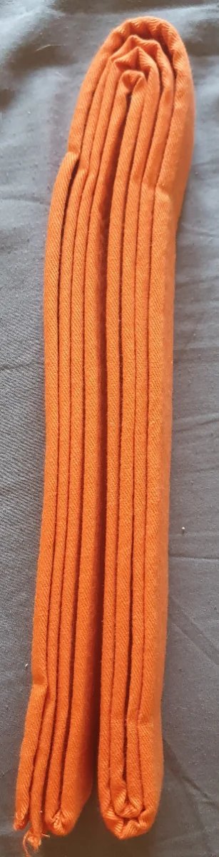 Cinturón artes marciales amarillo, naranja y verde