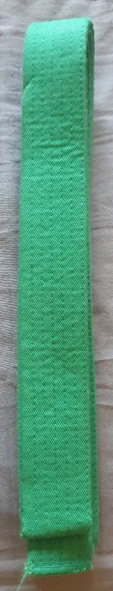 Cinturón artes marciales amarillo, naranja y verde