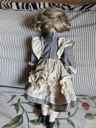 Muñeca porcelana vintage ojos azules