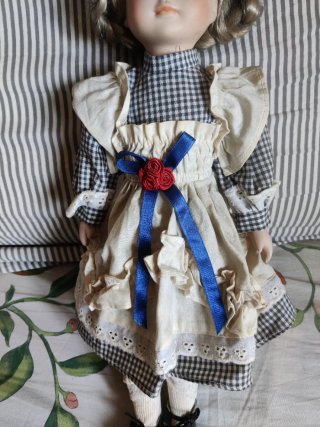 Muñeca porcelana vintage ojos azules