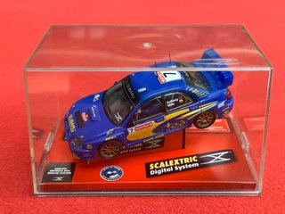 SUBARU IMPREZA WRC SOLBERG "WORLD CHAMPION" (SCX)