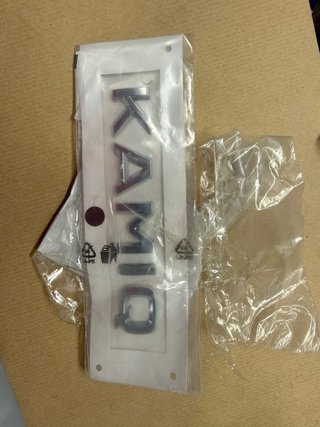 Anagrama KAMIQ de Skoda.