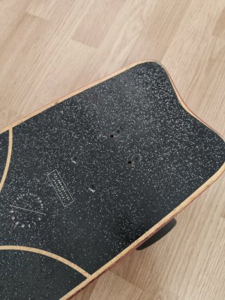 Longboard con diseño de ola
