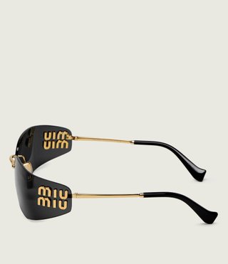 Miu Miu Gafas de Sol Negras con Detalles Dorados