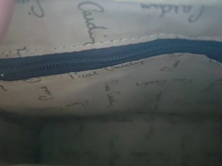 Bolso marrón con cadena