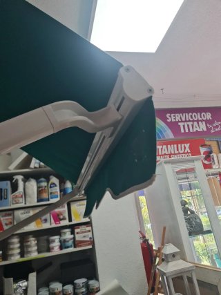 Toldo verde 1.10m con brazo 0.60m nuevo