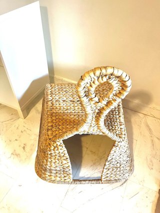 Sillón balancín de suelo de mimbre