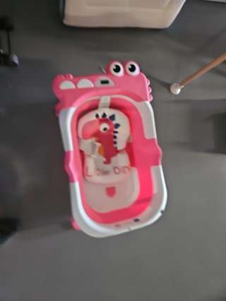 Bañera para bebé con diseño de dinosaurio