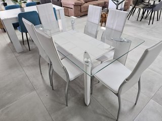 Mesa de cristal templado con revistero y 6 sillas