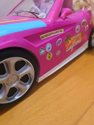 Muñeca Nancy en Coche Rosa