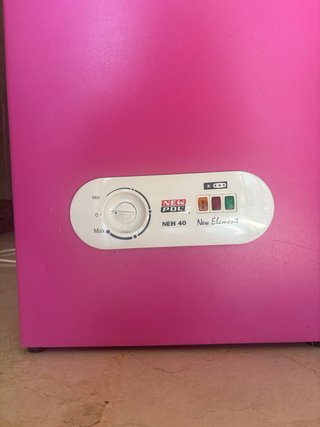Nevera eléctrica rosa