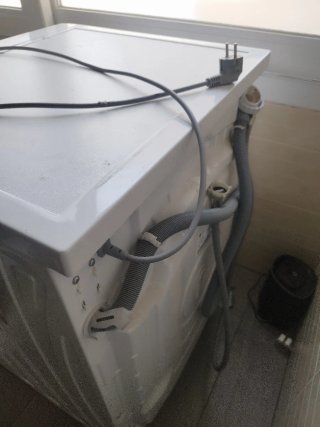 Lavadora LG Blanca de 9Kg, centrifugado 1400 rpm