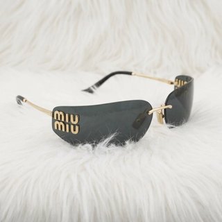 MIU MIU gafas de sol Negras con Detalles Dorados