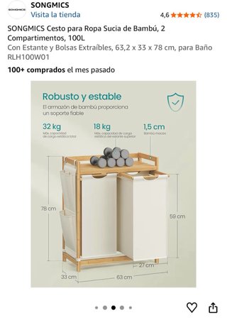 Mueble de baño y armario nuevo con cesta de ropa.