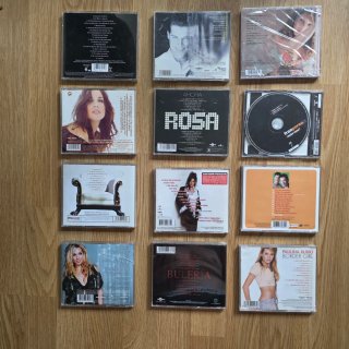 Lote 12 CDs: Rosa, Nuria, Evita, Bisbal, Paulina..