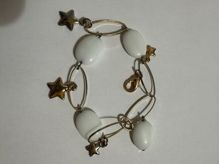 Bracciale vintage con ciondoli stelline