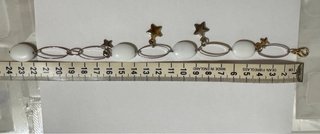 Bracciale vintage con ciondoli stelline