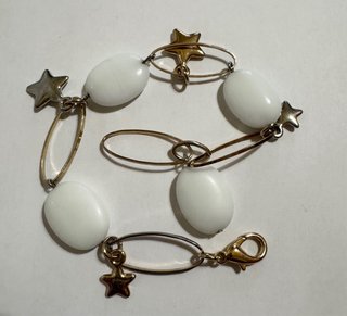 Bracciale vintage con ciondoli stelline