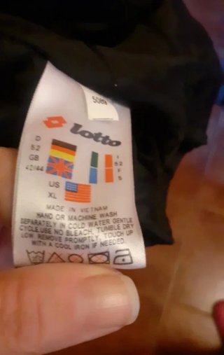 Chubasquero Lotto Negro y Blanco